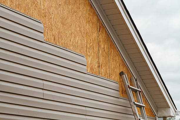 Professional Siding Replacement technician working in East Rochester, NY